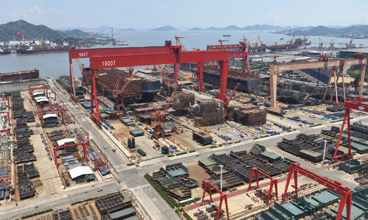 Shipyard illustration with gantry cranes and vessels under construction